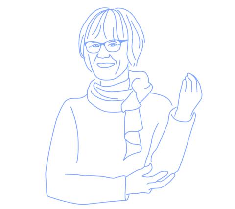 Tarja Rapala-Virtanen smiling and supporting her left arm with her right hand.